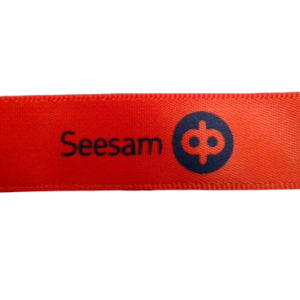 Oranžinė juostelė su logotipu Seesam